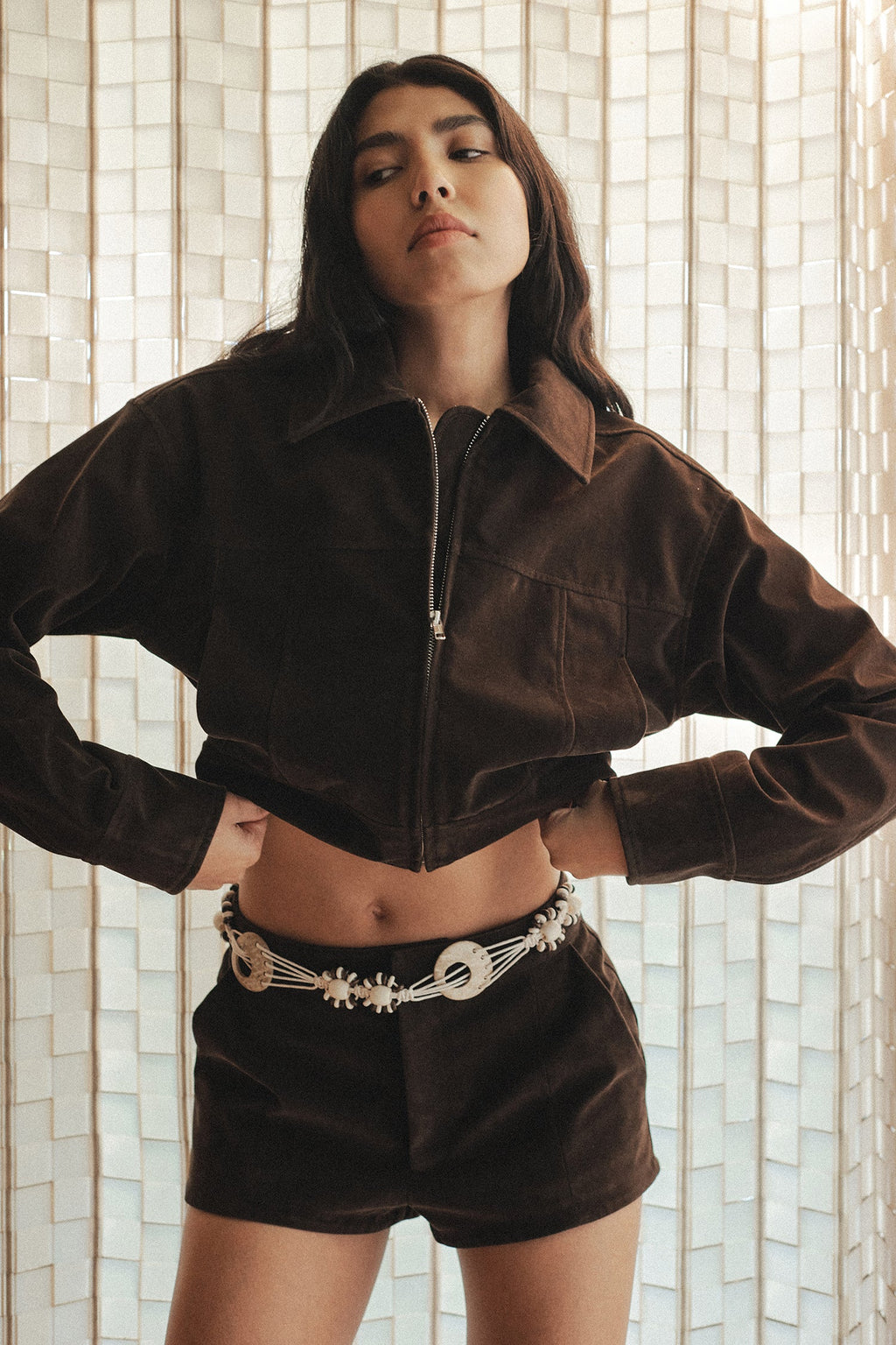 Gina Bomber Jacket — rum raisin structured suede bomber with pockets and top-stitch accents, model view from front