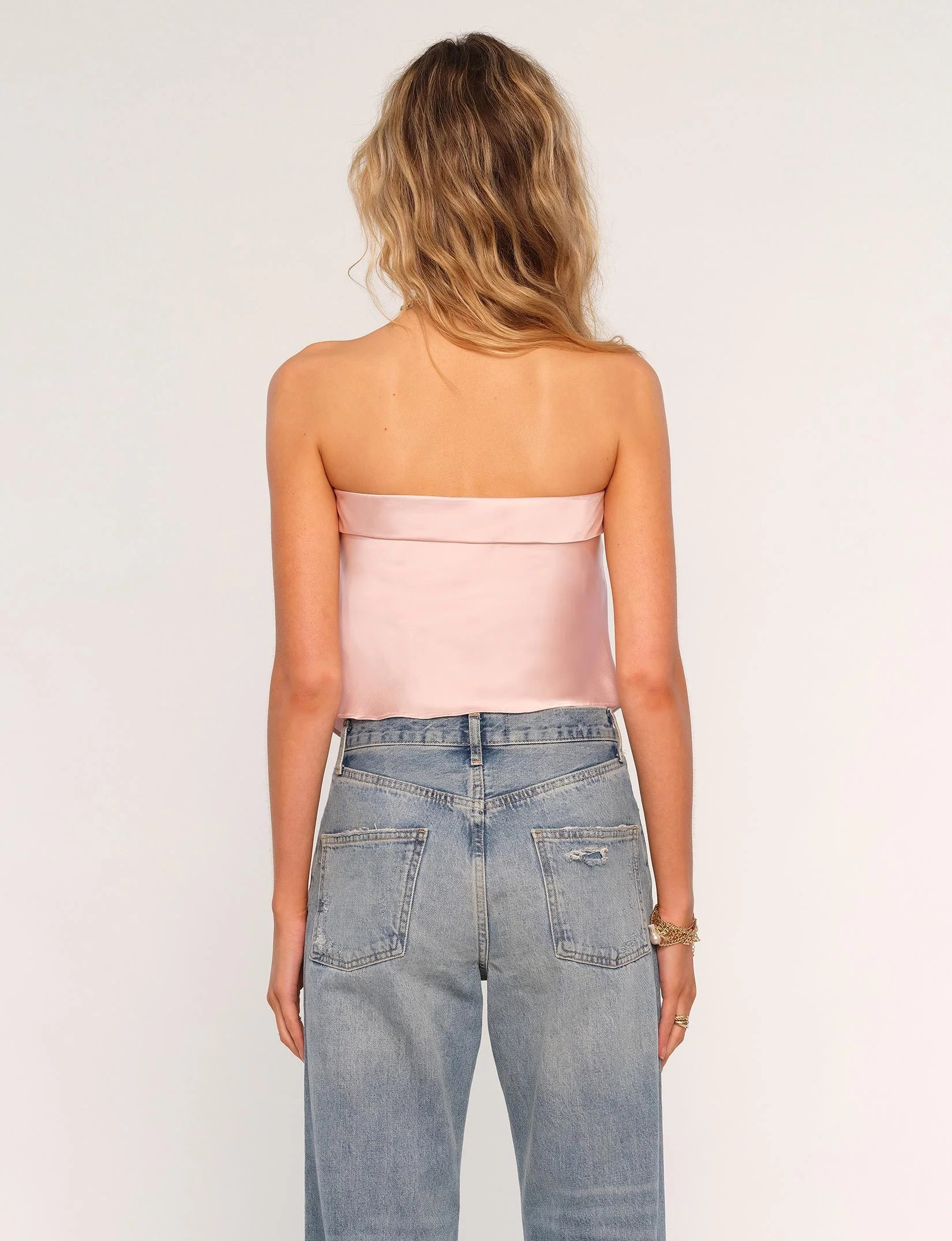Women's strapless light pink satin top