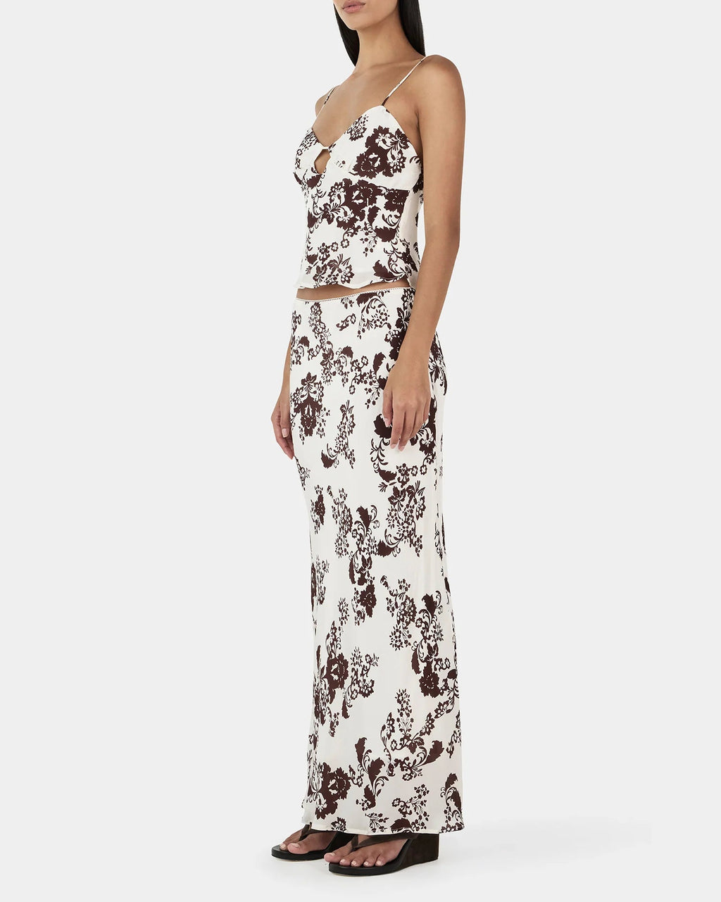 Karly Cami in crème floral—relaxed-fit mid-length camisole with adjustable rouleau straps and keyhole detail on model