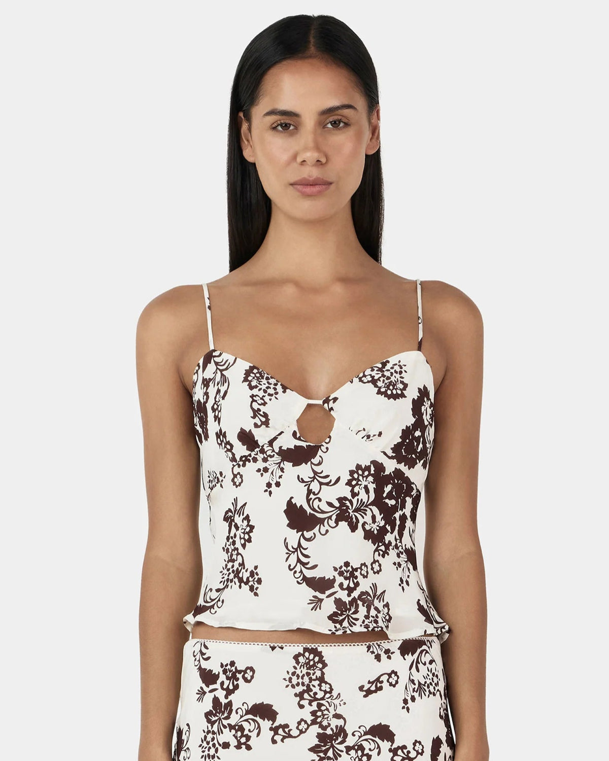 Karly Cami in crème floral—relaxed-fit mid-length camisole with adjustable rouleau straps and keyhole detail on model