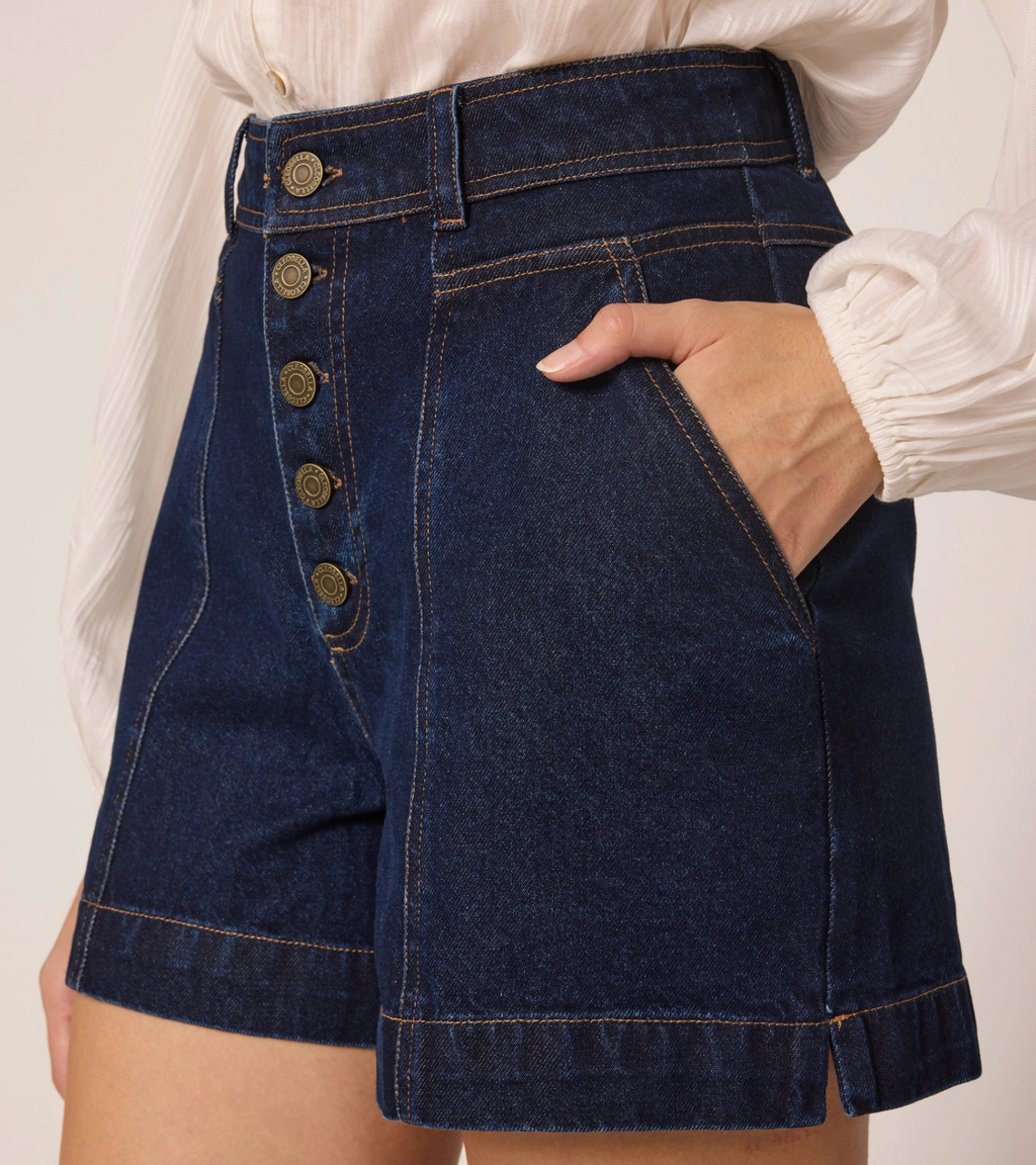 high waisted dark denim shorts with ivory top
