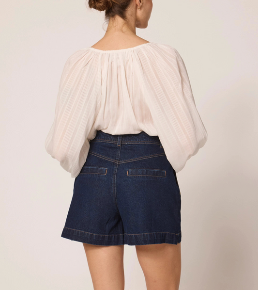 high waisted dark denim shorts with ivory top