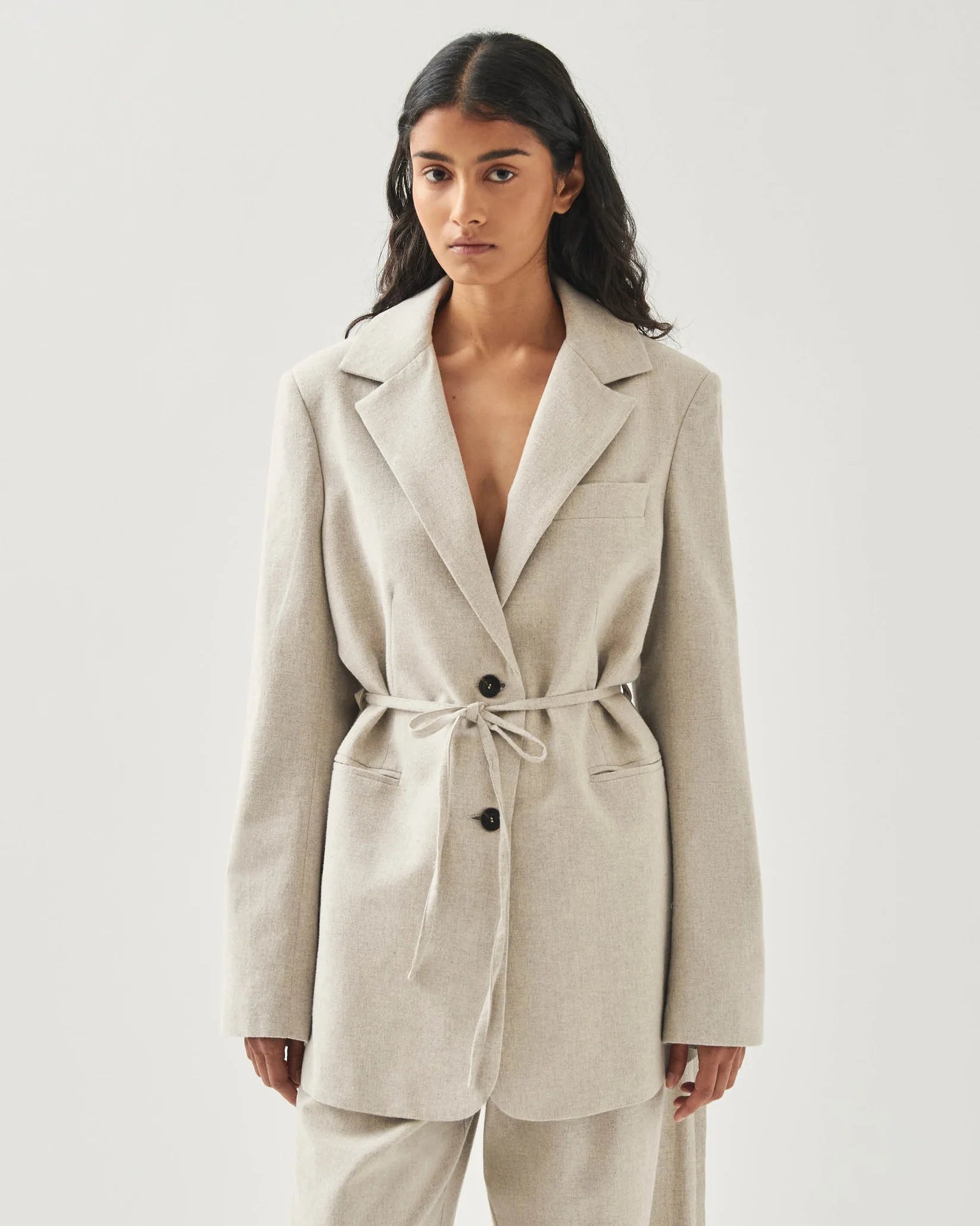 Women's oversized blazer in cream with tie waist belt