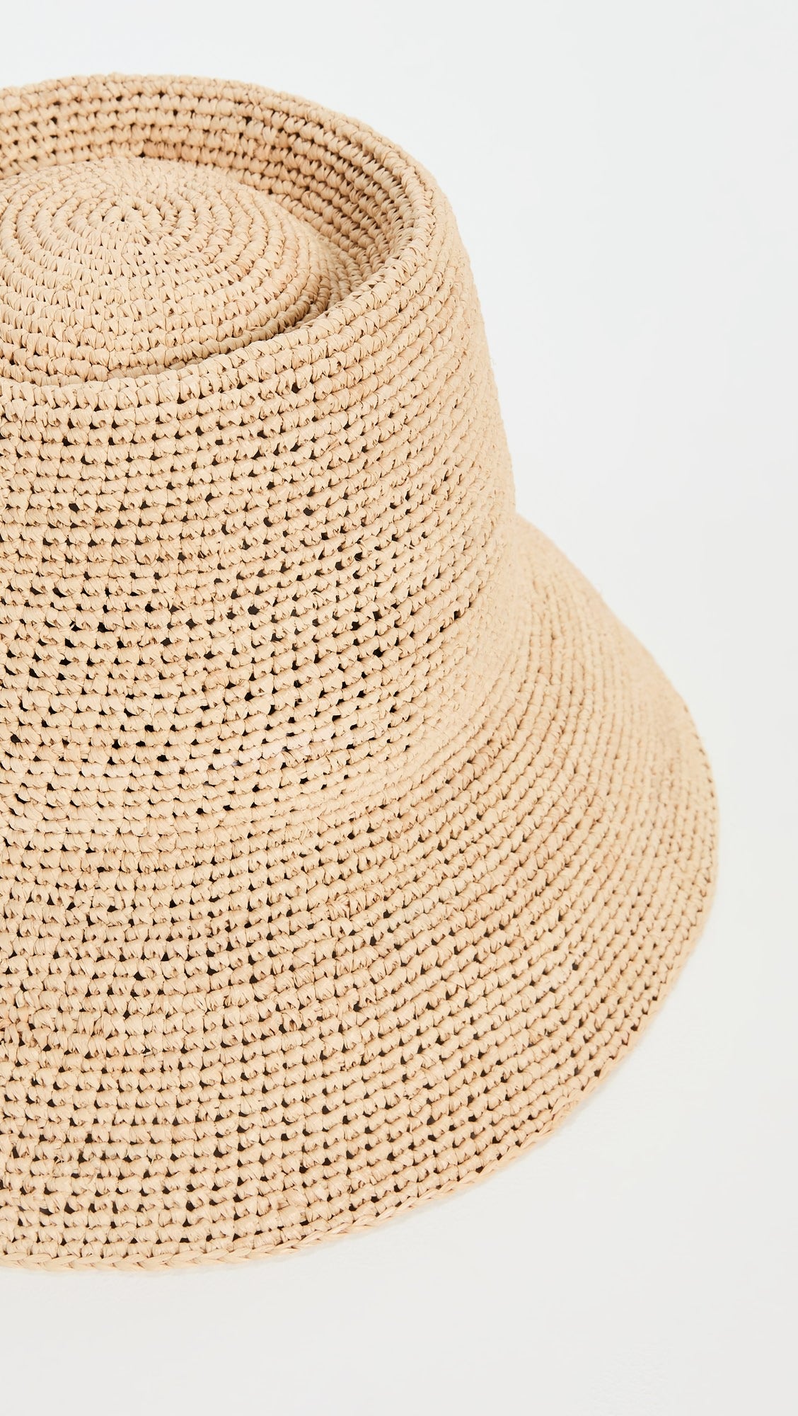 Packable raffia bucket hat by Janessa Leone – handwoven travel hat