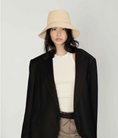 Load image into Gallery viewer, Front view of Felix raffia bucket hat – structured crochet sun hat


