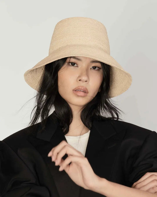 Packable raffia bucket hat by Janessa Leone – handwoven travel hat