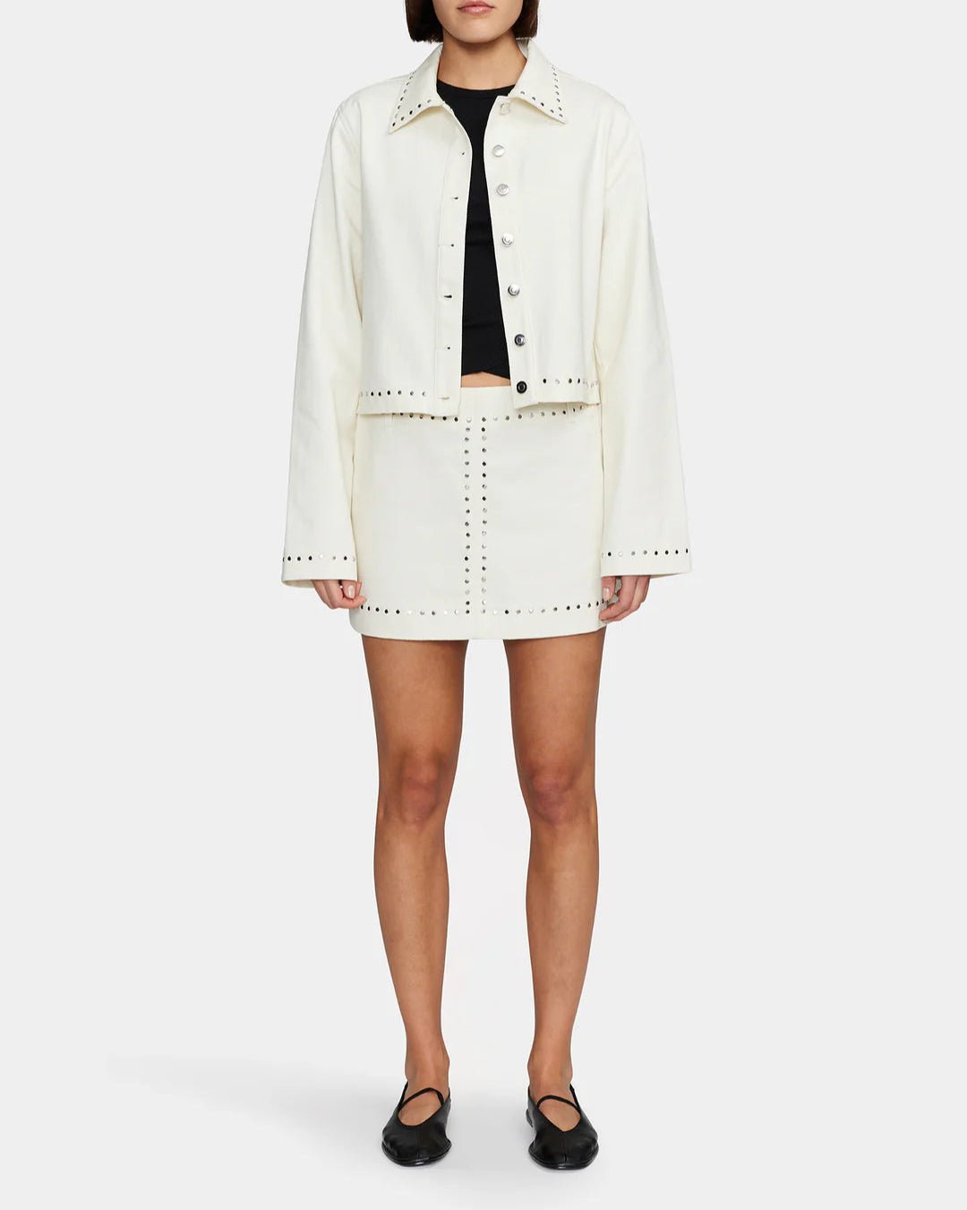 Women's cream colored mini skirt with studs