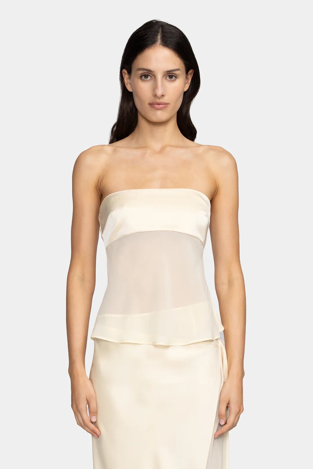 Pale strapless top with satin and sheer fabric