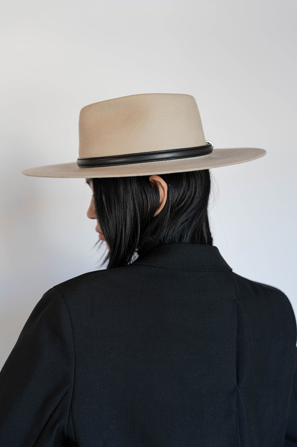 beige wool fedora paired with oversized blazer