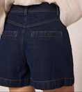 Load image into Gallery viewer, high waisted dark denim shorts with ivory top
